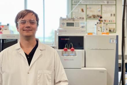 Jindar Sboto smiles while working in a VIU Chemistry lab.