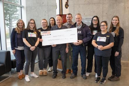 Group of VIU Nursing students accept a cheque